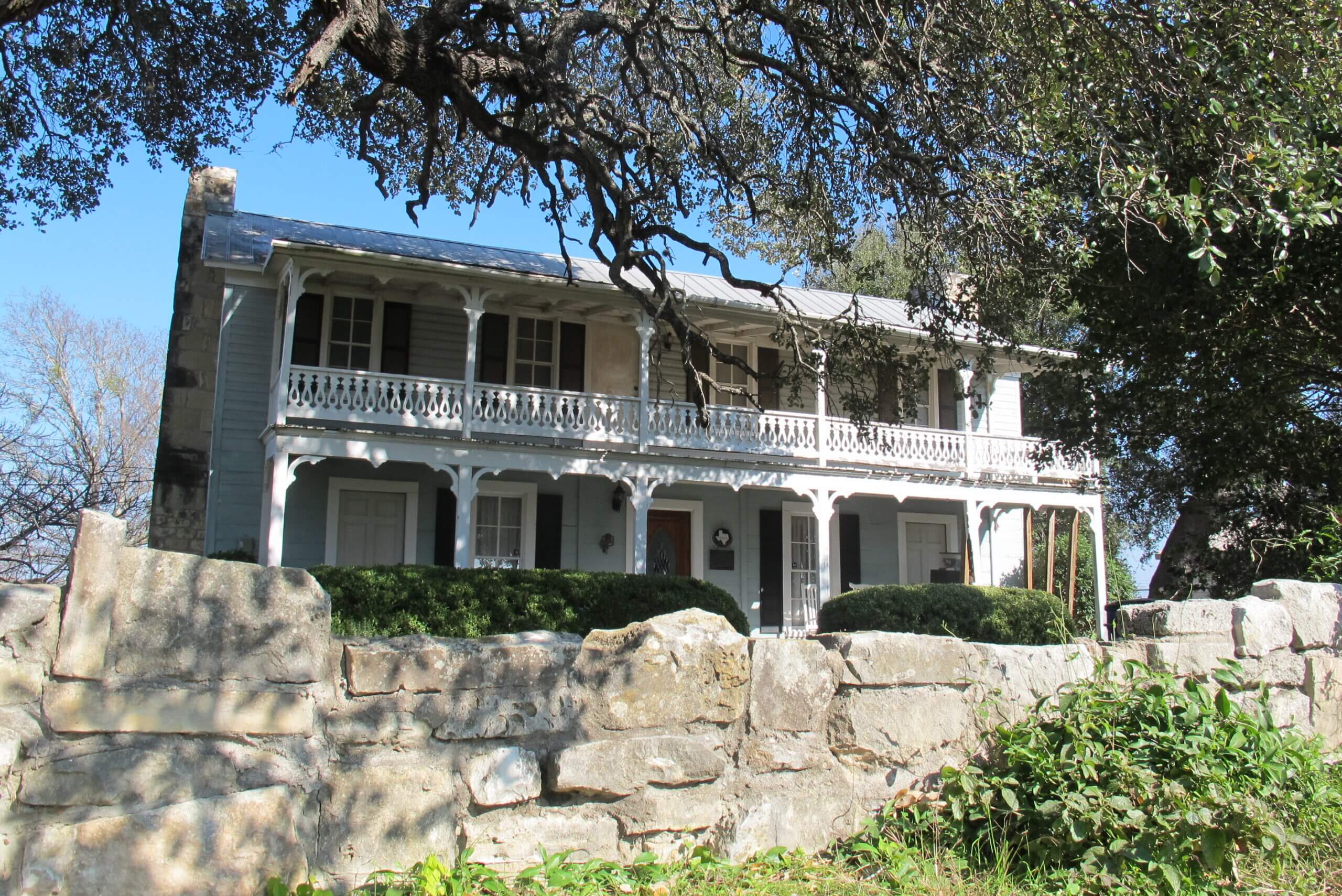 Front stone wall at 600 S Bagdad Road