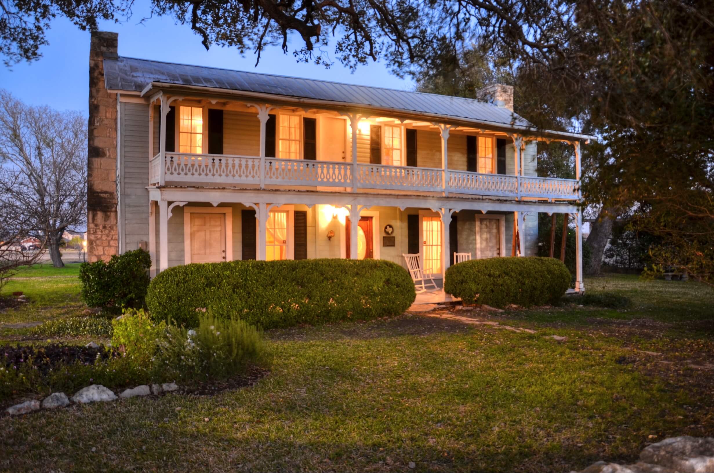 600 S Bagdad Road historic house at night